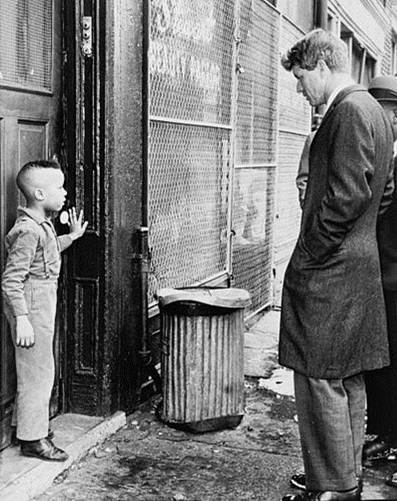 Robert F. Kennedy confronting racism and poverty. 
