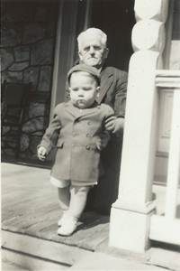  Al with his grandfather on the porch 