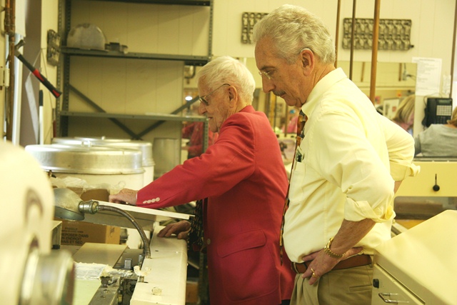 Bud showing me the old coating machine