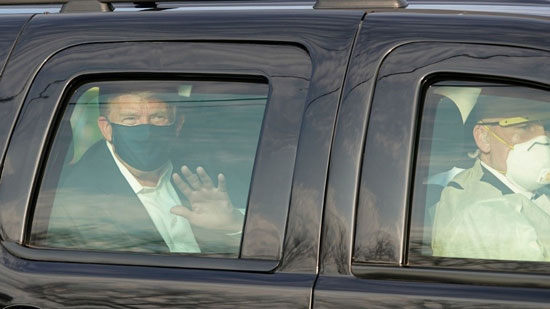 Trump is wearing a mask as he leaves Walter Reed.