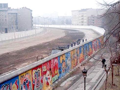 It is obvious which side was East and West Berlin looking at the Wall.