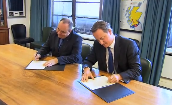  Alex Salmond and David Cameron signing the agreement, which was the first act toward devolution.