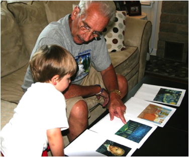 Al and Jack looking at prints