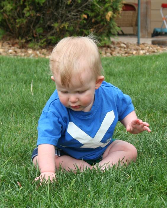 Owen playing in the grass