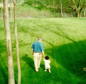 Al and Ayanna walking in the garden