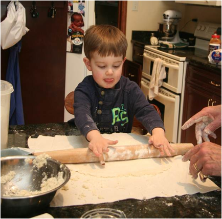 Description: Jack rolling out the dough