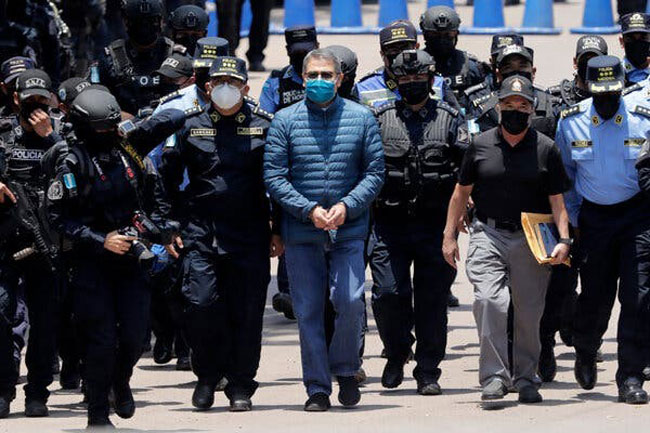 The caption under this photo read: “When Juan Orlando Hernández was extradited to the United States, his own country erupted in celebration.”