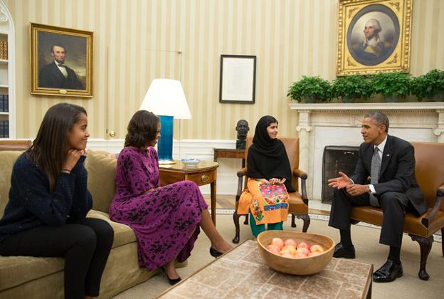 This photo was taken in the White House with Malia, Michelle, Malala, and the president.
