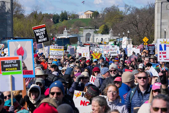 These protestors are near the Memorial Bridge in Arlington VA.
