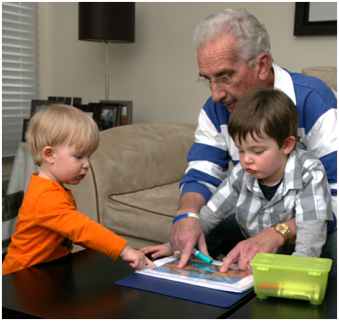 Description: Description: Al looking at art with Jack and Owen