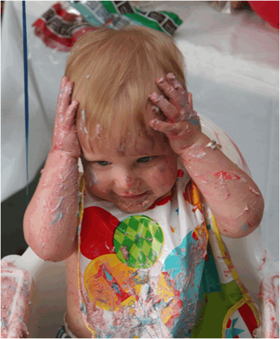 Owen messy with cake