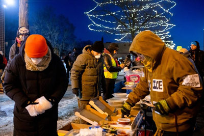 Minnesotans share their food in the bitter cold night.