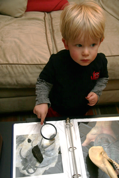 Owen using a magnifying glass