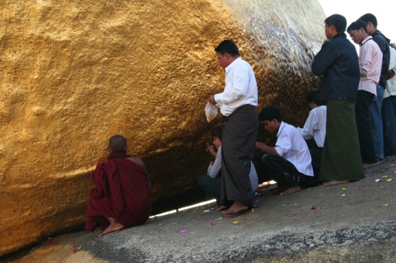 Believers worshiping at the rock