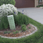 While Gluing Down My Flowerbed Rocks