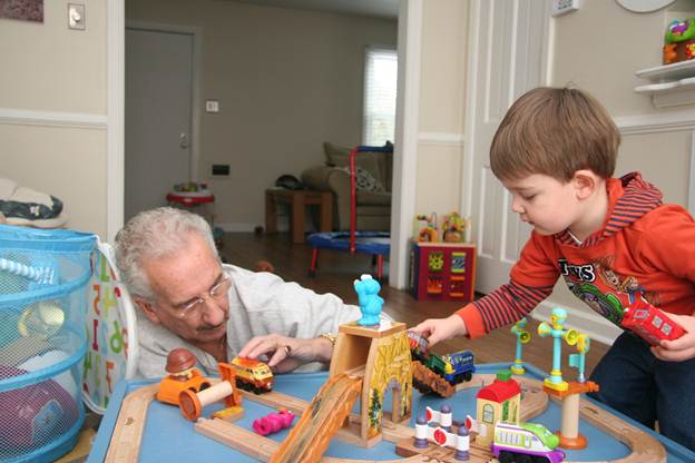 Al and Jack playing with trains